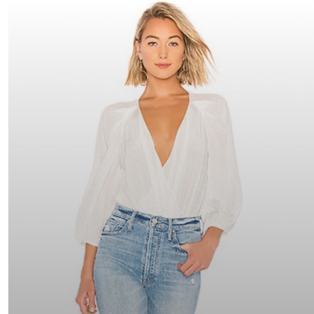 Bcbg 100% silk off white bodysuit Retail $248 size  Xs in very good condition